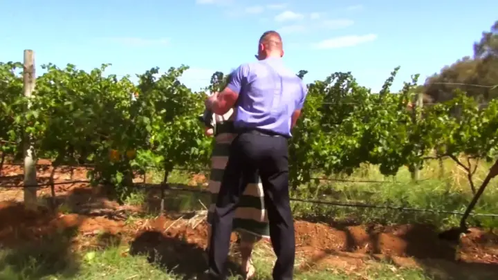 Blonde in glasses gets choked while threesome in vineyard